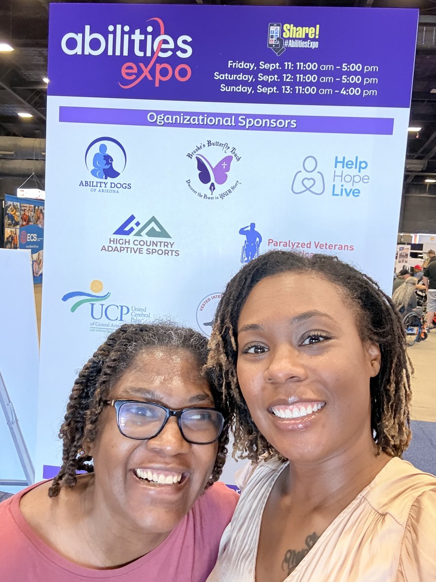 Ashlee (right) and her sister Erica at the Abilities Expo.